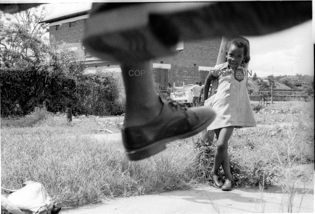GIRL AND SHOES ON SWING
